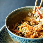 Asian-Rice-with-Pork,-Mu-Err-Mushrooms,-Napa-Cabbage,-Pickled-Bamboo-Shoots,-Spinach,-Teriyaki,-Sweet-Chili-Sauce,-Onion-Chips-in-Ceramic-Bowl.-Thai,-Chinese,-Japanese-Traditional-National-Cuisine
