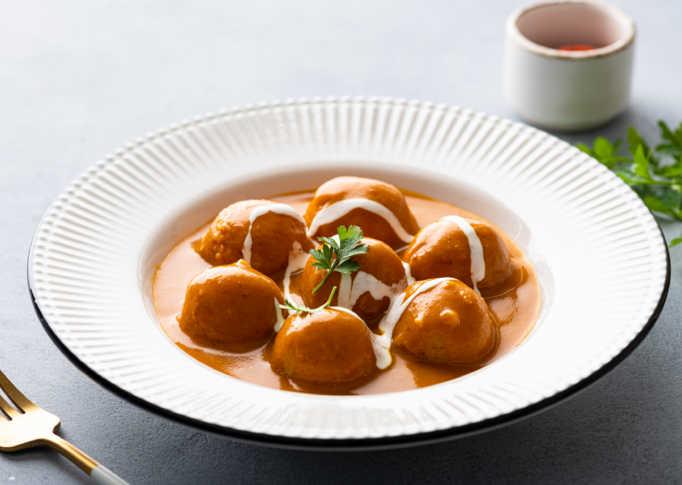 Malai Kofta Curry is one of the most popular Indian curries and is often served with crispy butter naan. 
