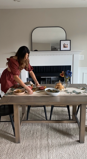 Jenny Meassick setting a table